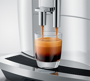 Machine a cafe a grain Jura E4 Pianowhite extraction